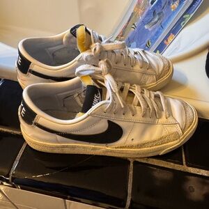 Nike Women’s Mid Low 77 White and Black Sneakers